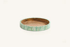 Green and white bone inlay round tray with striped design and natural wood centre.