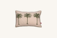 Decorative European flax linen cushion with palm tree design on a beige background