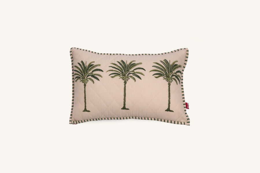 Decorative European flax linen cushion with palm tree design on a beige background