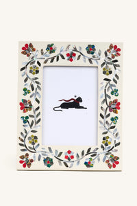 Front view of the Mother of Pearl inlay photo frame with multicolour floral border.