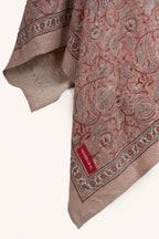 Close up of the pink floral hand block print European flax linen tablecloth.