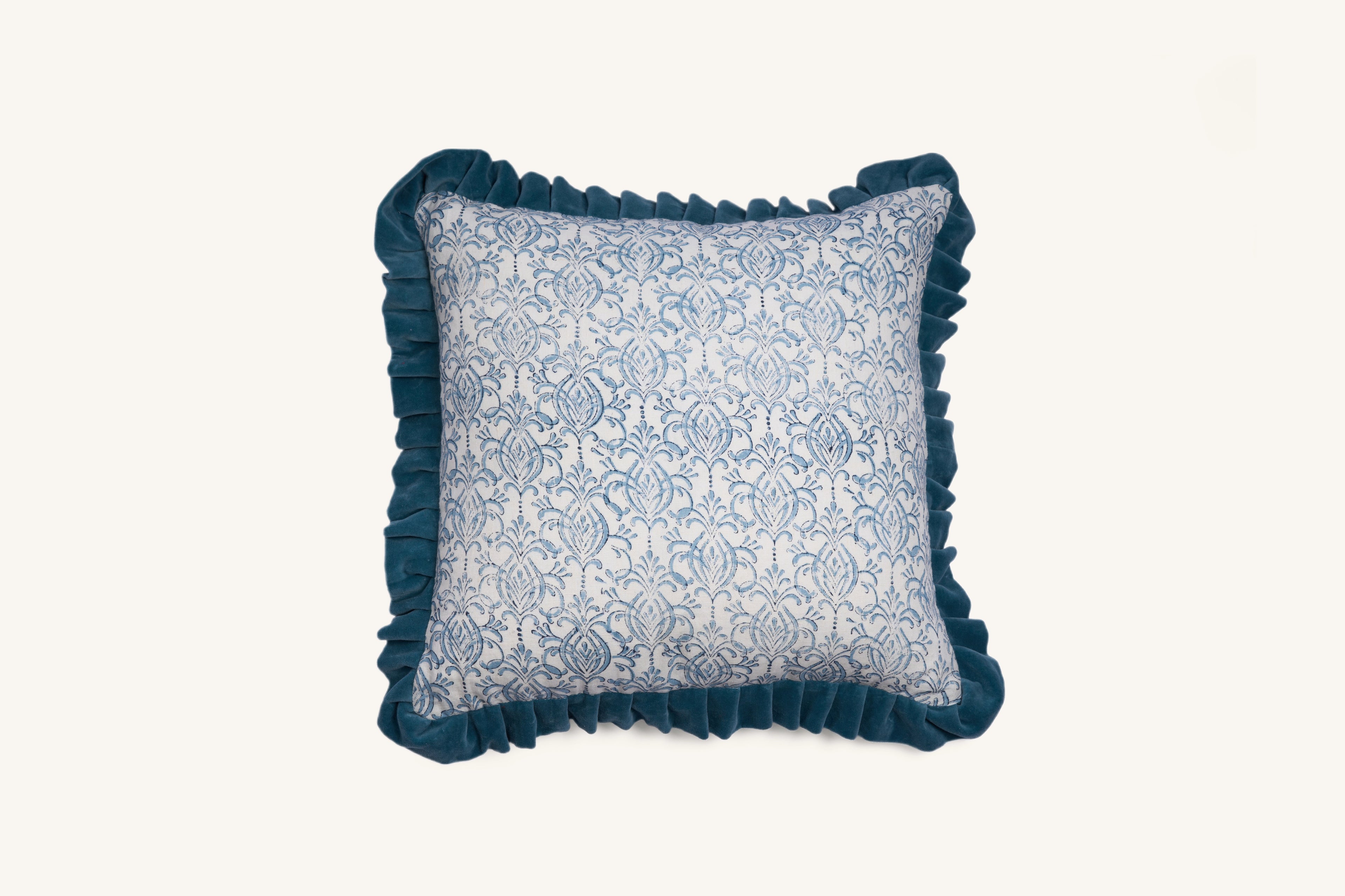 Blue hand block print European flax linen cushion with teal velvet ruffle.