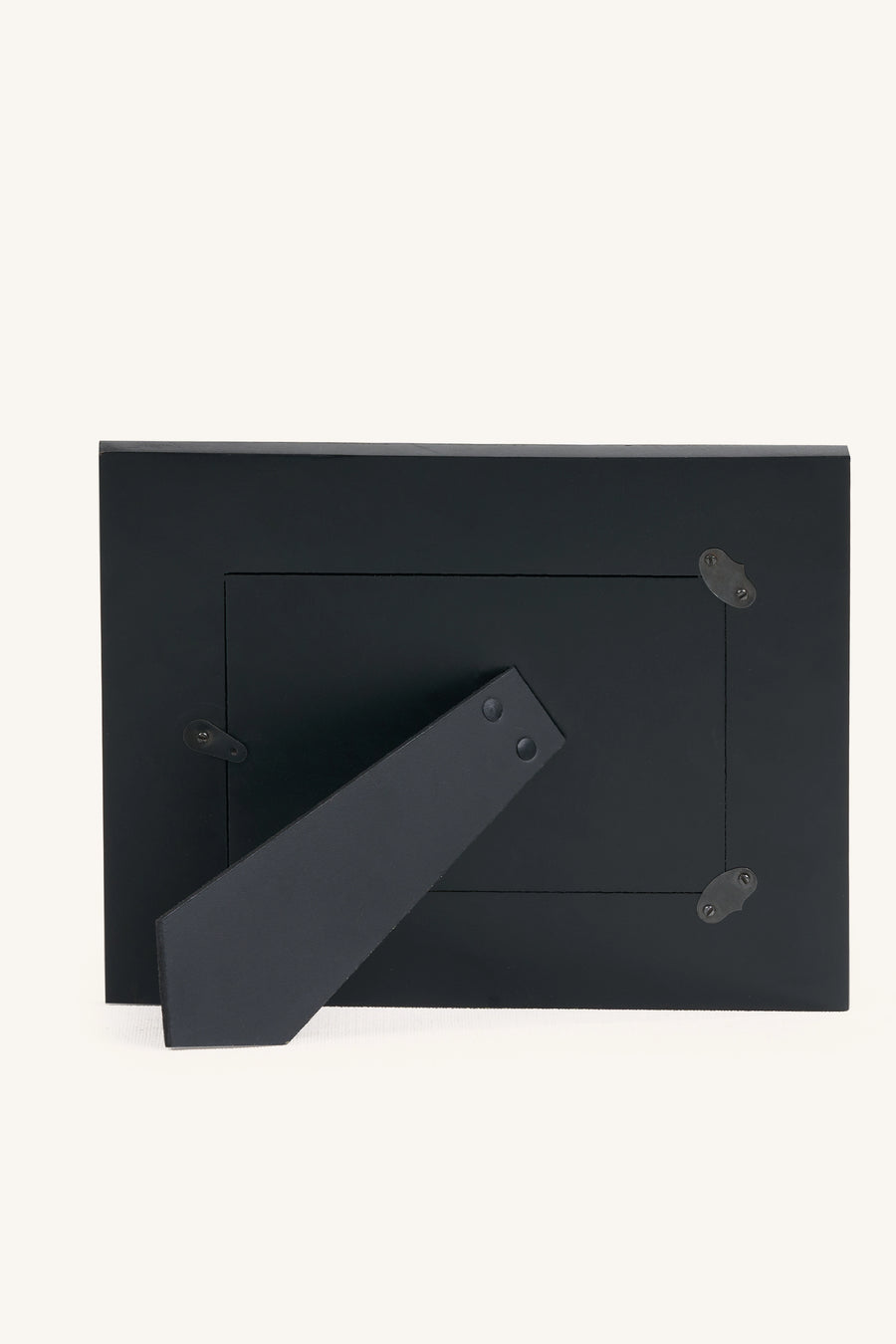 Rear view of the square red and ivory bone inlay photo frame with black stand.