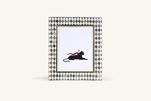 Charcoal and ivory bone inlay photo frame with harlequin diamond pattern.