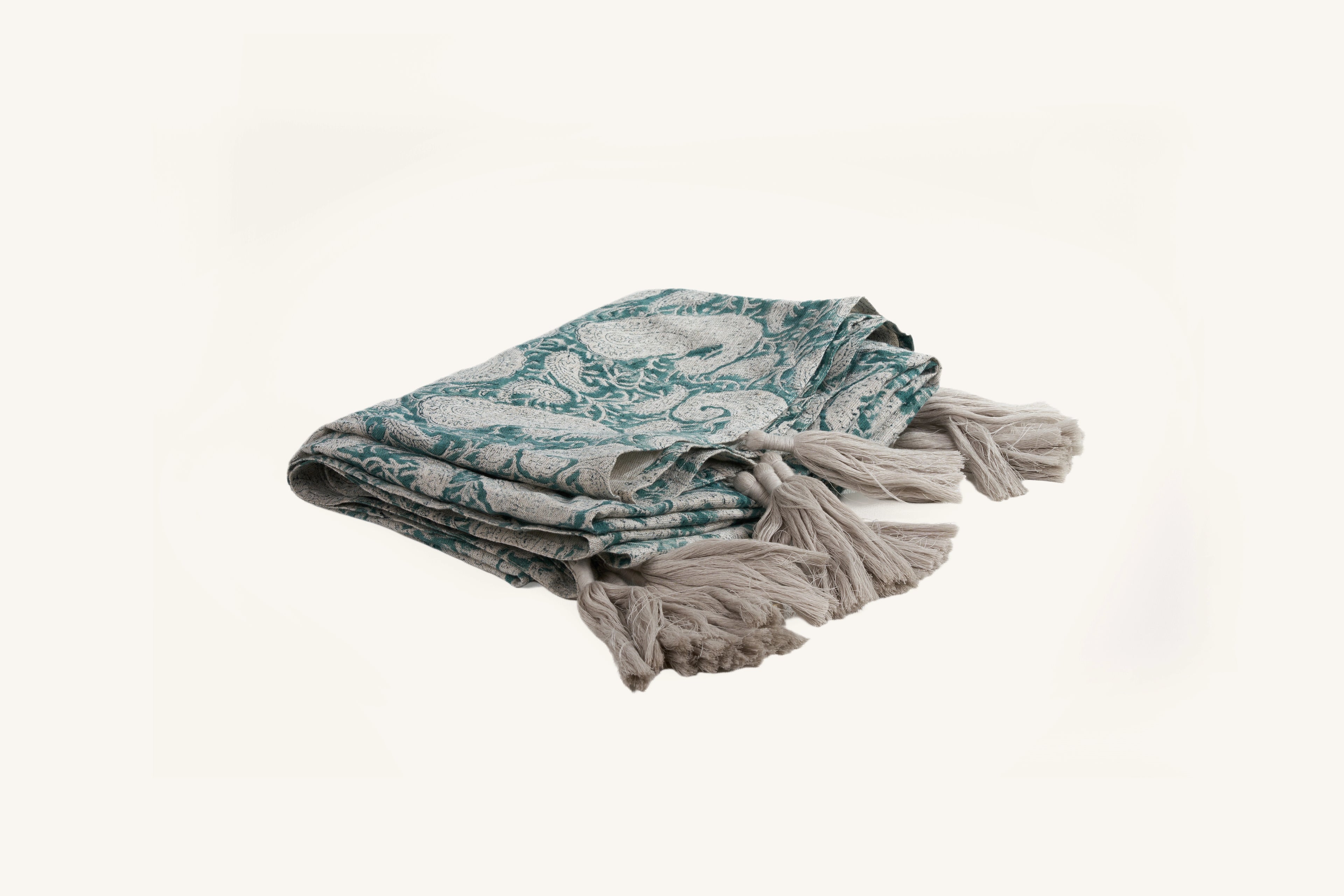 Teal hand block print European flax linen throw with tassels.