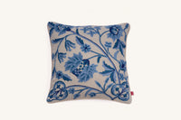 Blue crewel embroidered linen cushion with botanical design.