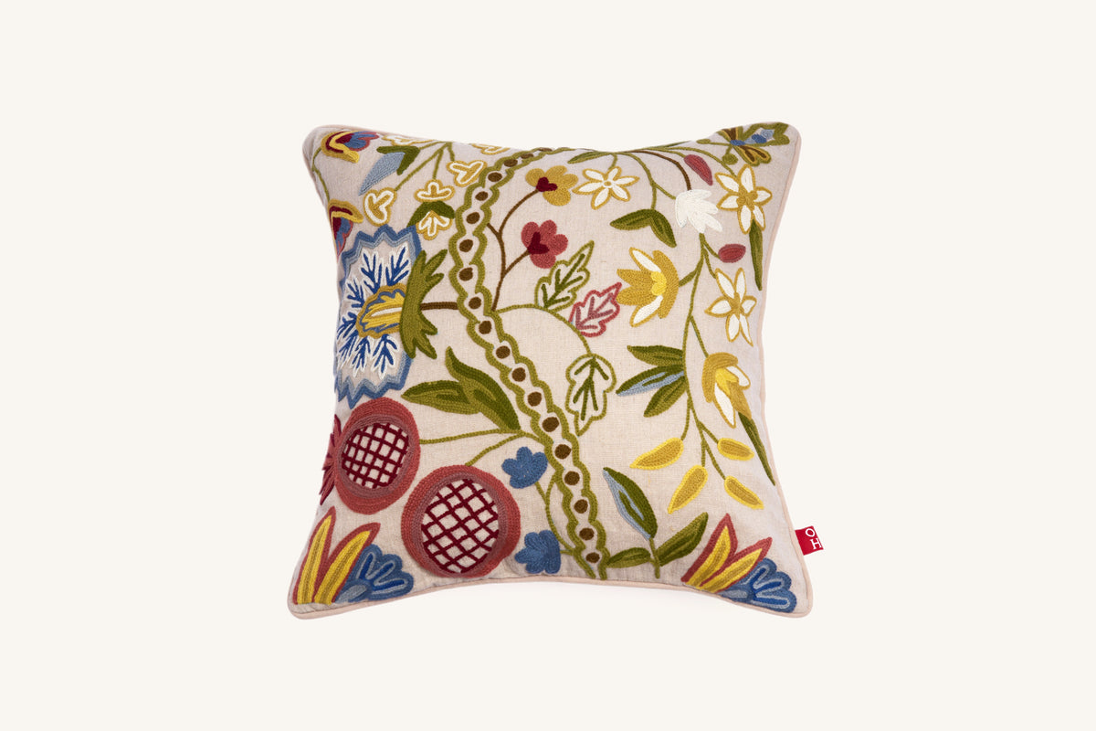 Primavera European linen cushion hand embroidered with Australian wool floral vines and pomegranate motif.