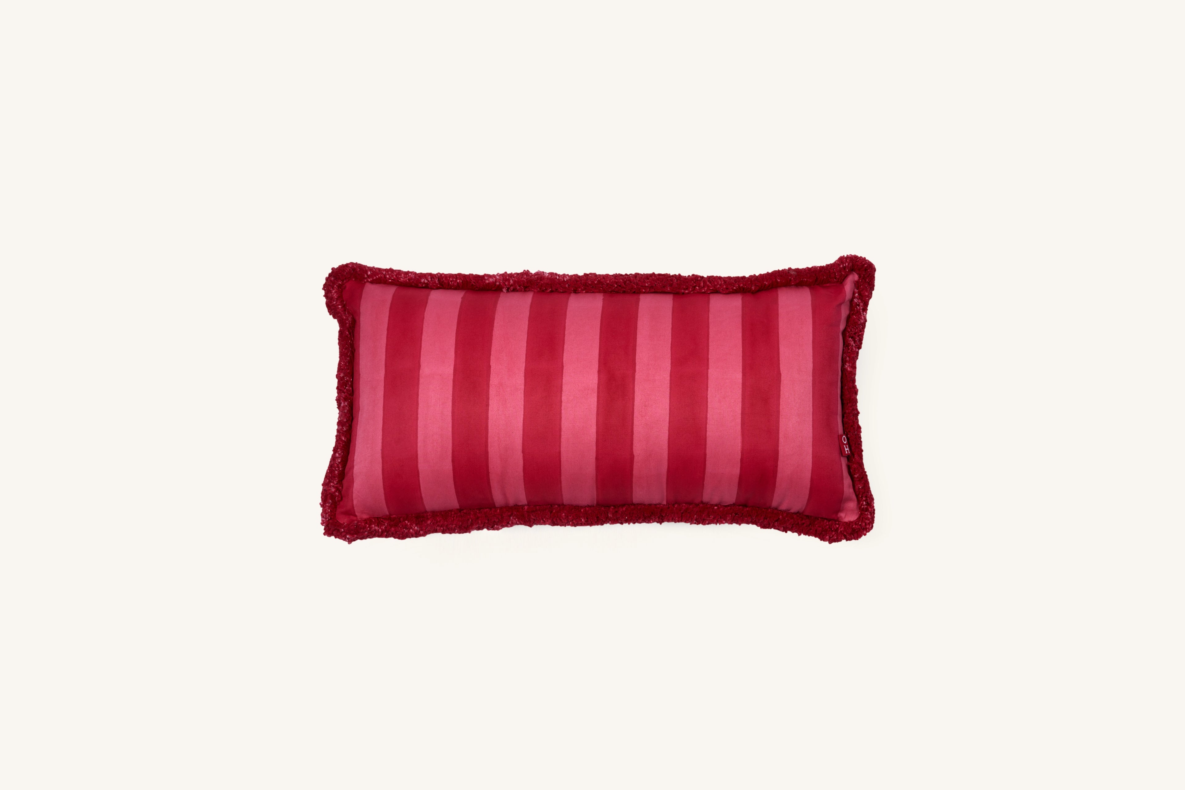 Red striped 1000 thread count cotton lumbar cushion with looped fringe.