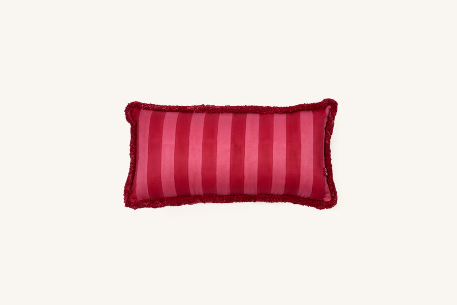 Red striped 1000 thread count cotton lumbar cushion with looped fringe.