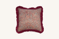 Square pink floral hand block print linen cushion with ruffled edge.