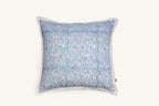 Sky blue hand block print European flax linen cushion with white flange edge.
