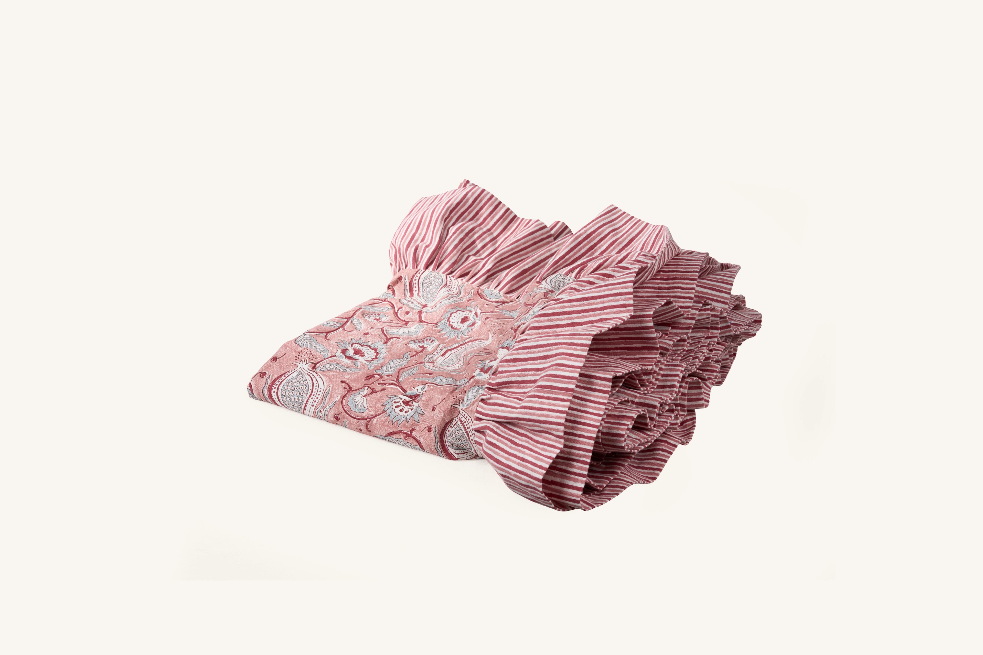 Pink floral hand block print cotton tablecloth with pleated striped ruffle.