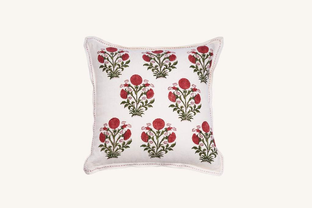 Square pink floral hand block print linen cushion with botanical design.