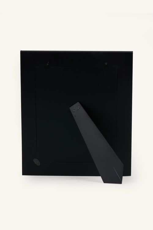 Rear view of the green and white bone inlay photo frame with stand.